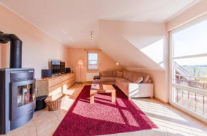 Storchenflug - Dachgeschosswohnung mit Kamin & Balkon am Fleesensee Göhren-Lebbin
